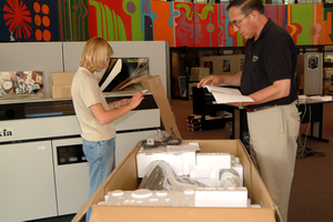 FLAAR personnel unpacking the Epson 7600 at FLAAR lab